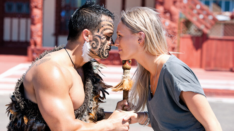 new-zealand-contiki, traveller meeting Maori person