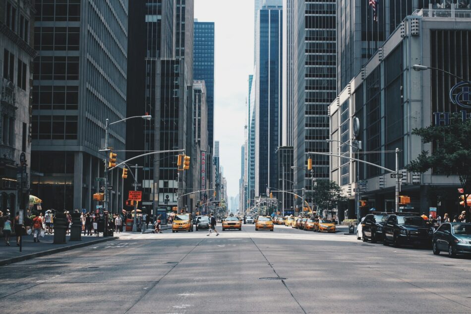 A city street with tall buildings.