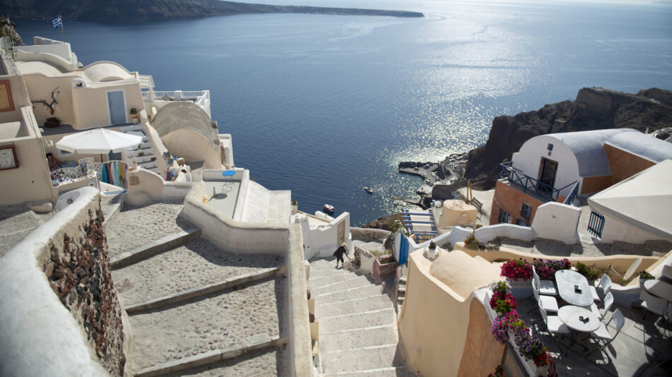 romantic travel destinations - image of a street in santorini