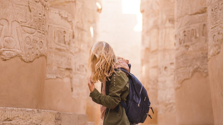 Woman exploring the Temples of Karnak, Egypt