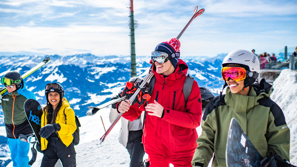 Group of skier and snowboards wearing Ski Outfits