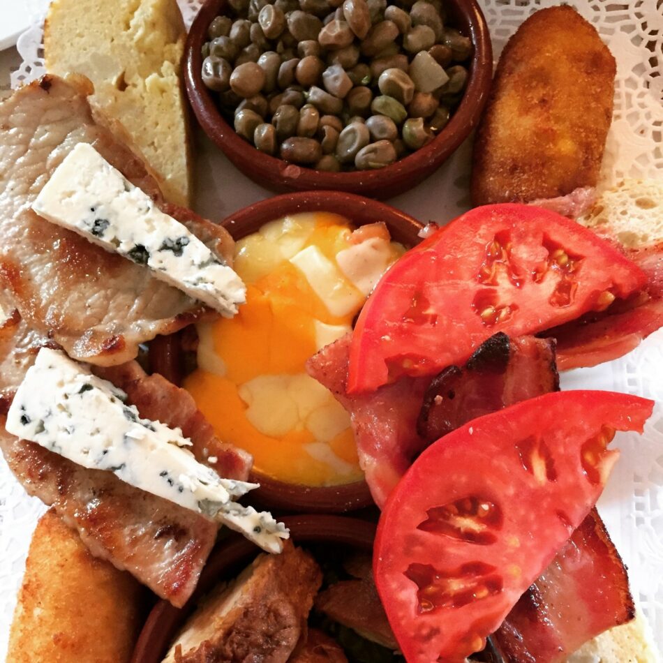 A plate with a variety of food on it.