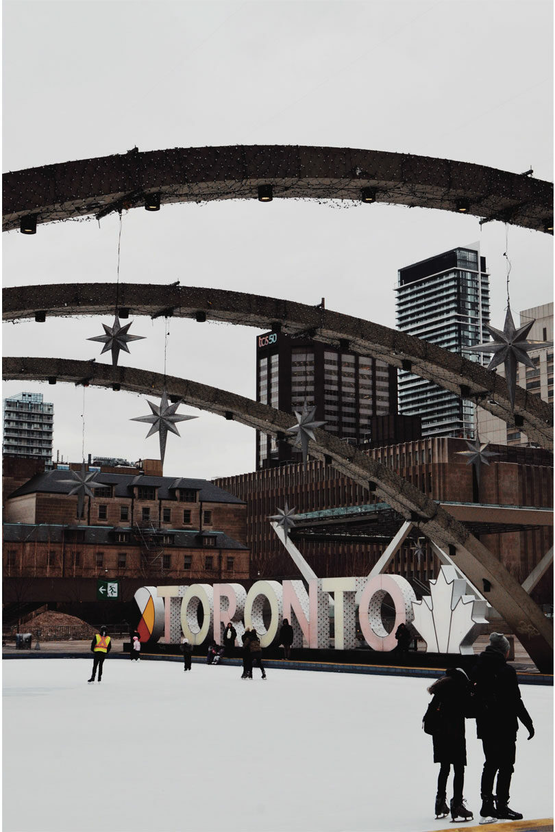 Ice skating in Nathan Phillips Square in Toronto, Canada