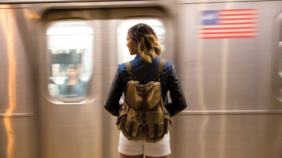 self improvement - image of a girl standing on a subway platform