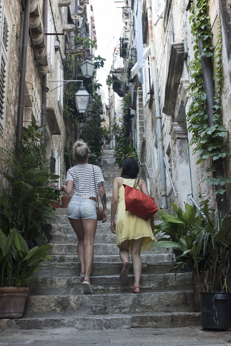 trip to europe - girls walking streets in dubrovnik