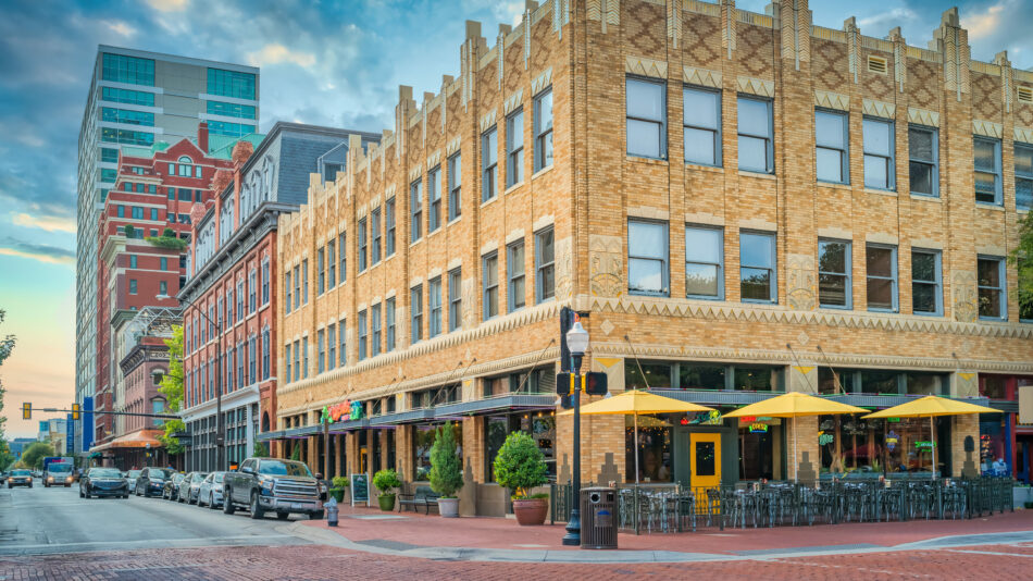 A brick building on a street, rumored to be one of The Last of Us filming locations.