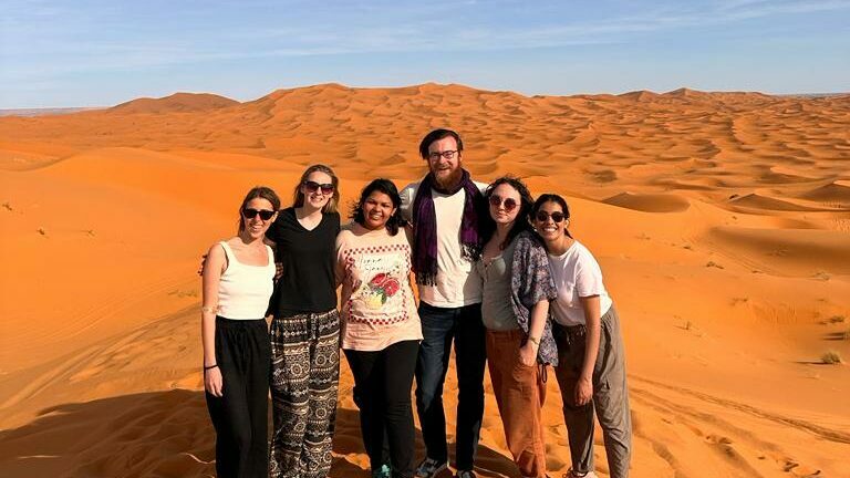 group of friends in the desert in Morocco