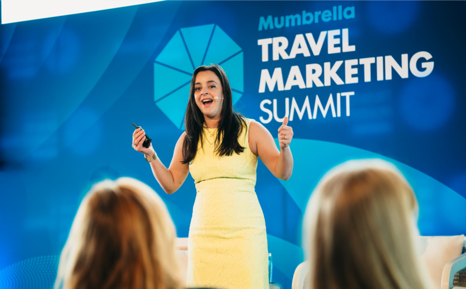 Young woman speaking at the Mumbrella Travel Market Sunmit