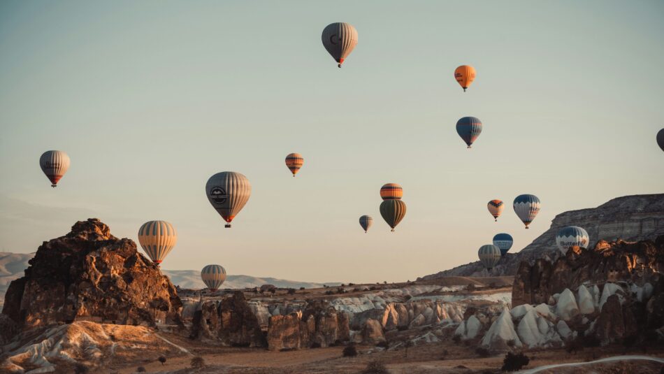 hot air balloons over the canyons of Cappadocia