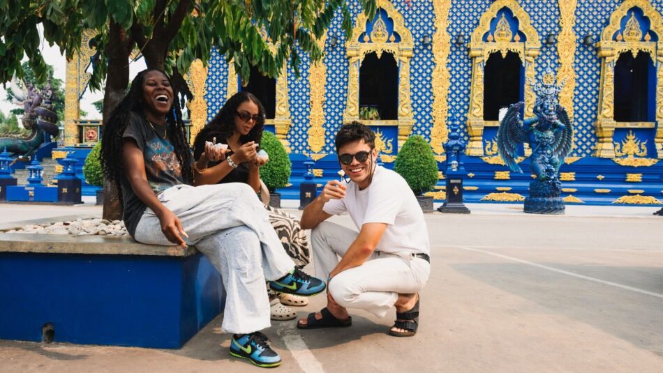 Contiki travellers at a temple in Thailand