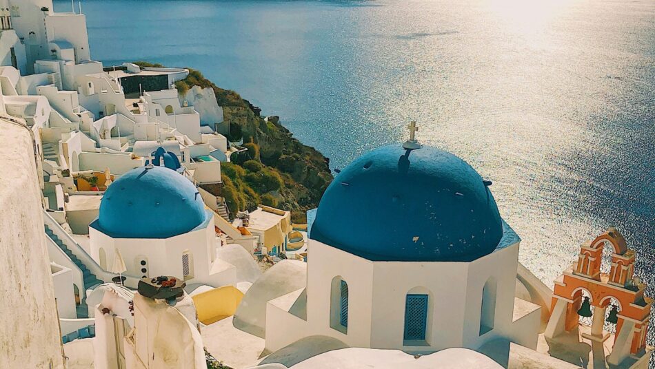 blue dome and white buildings of the Greek islands