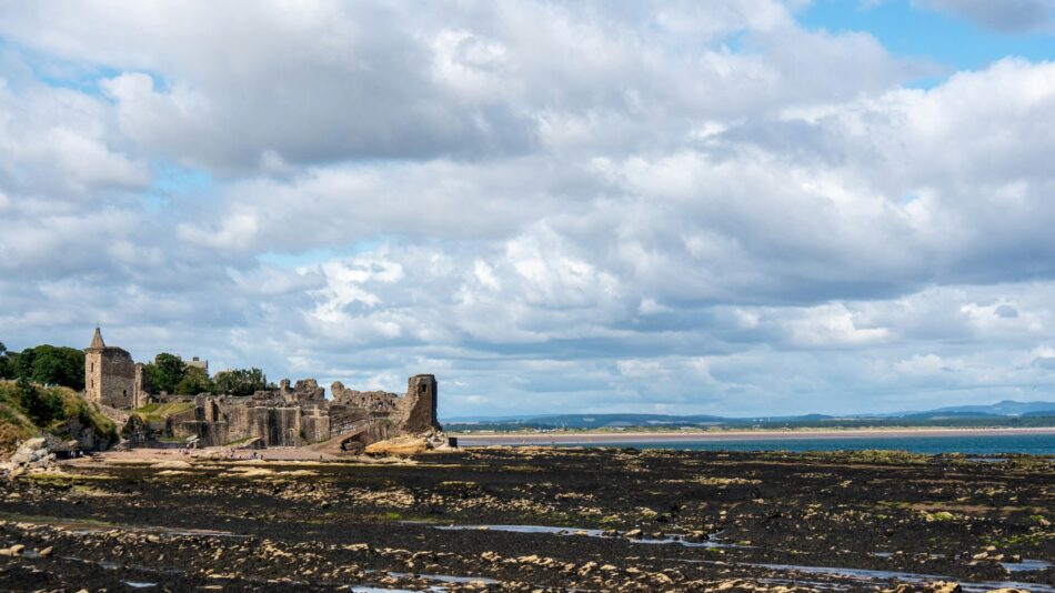 the ruins of St. Andrews castle by the beach in Scotland