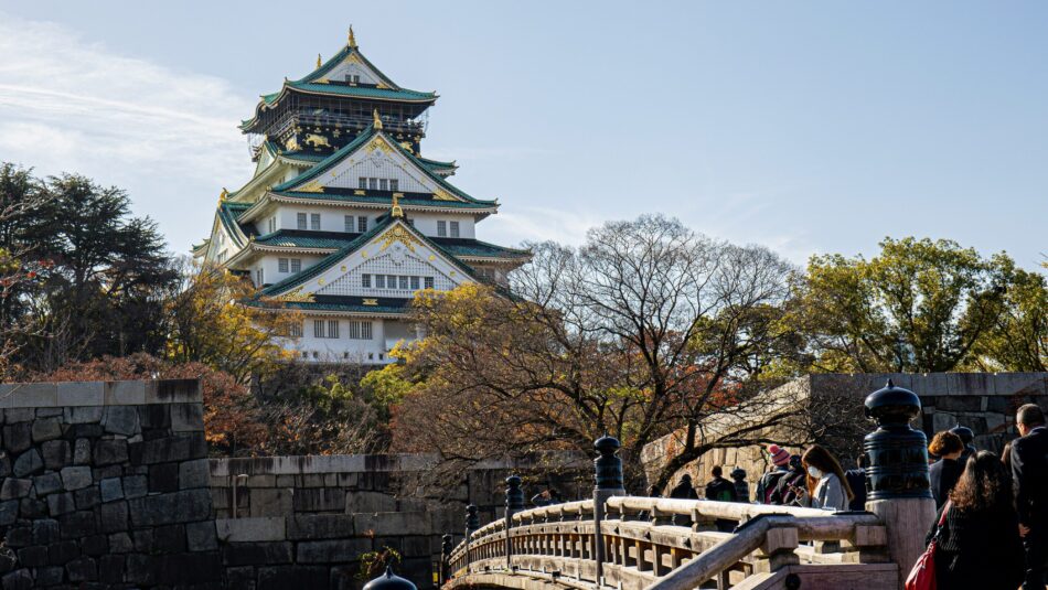 views of Osaka Castle in Japan during the autumn