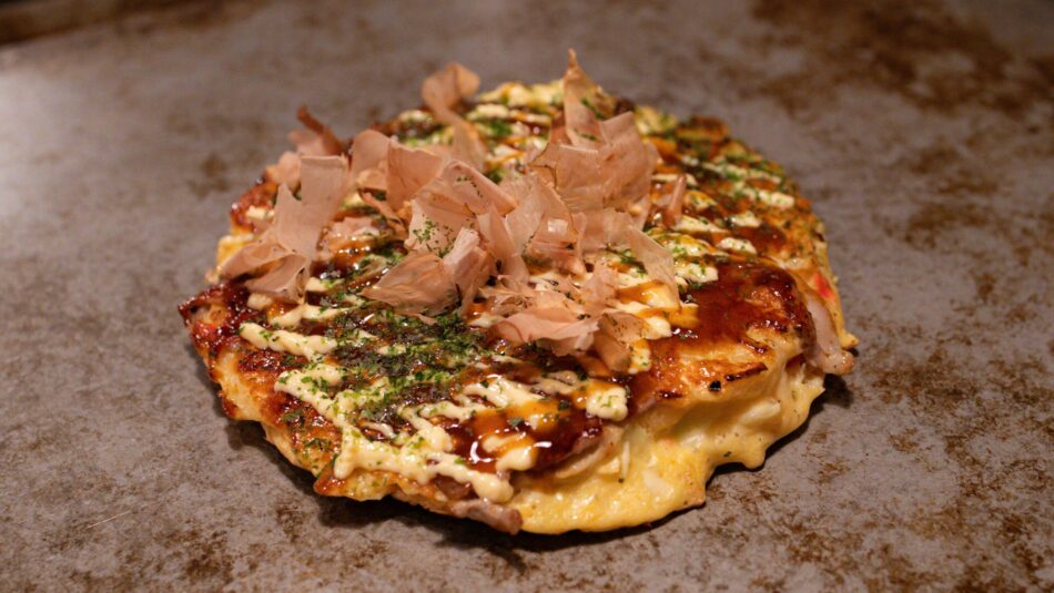 Okonomiyaki, a Japanese seafood pancake for lunch