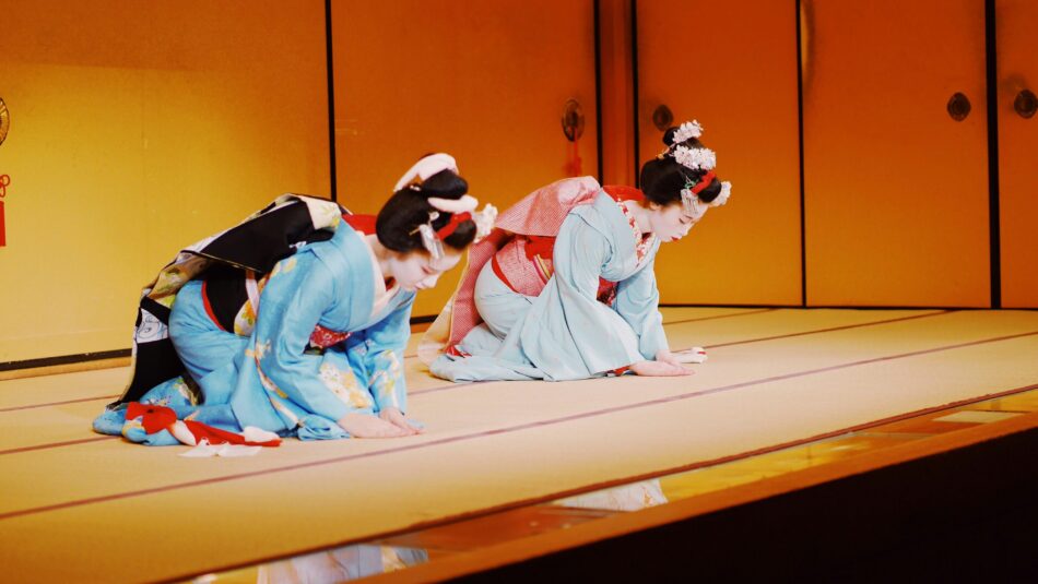 geishas in Japan dressed in their ornate kimonos