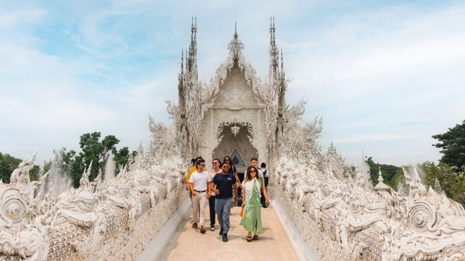 the white porcelain walls of Wat Rong Khun temple in Thailand
