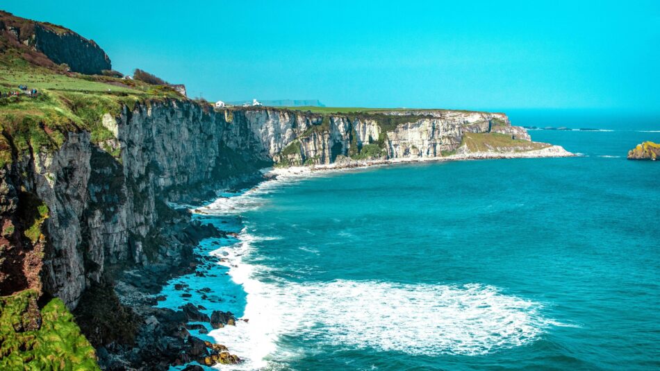 white cliffs with blue water off the coasts of Ireland