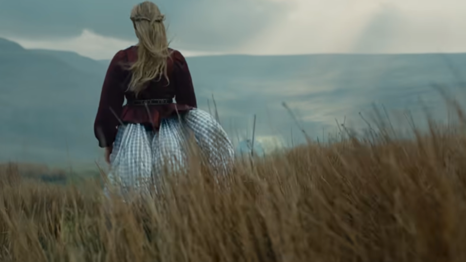 Wuthering Heights Margot Robbie in field in Northern England